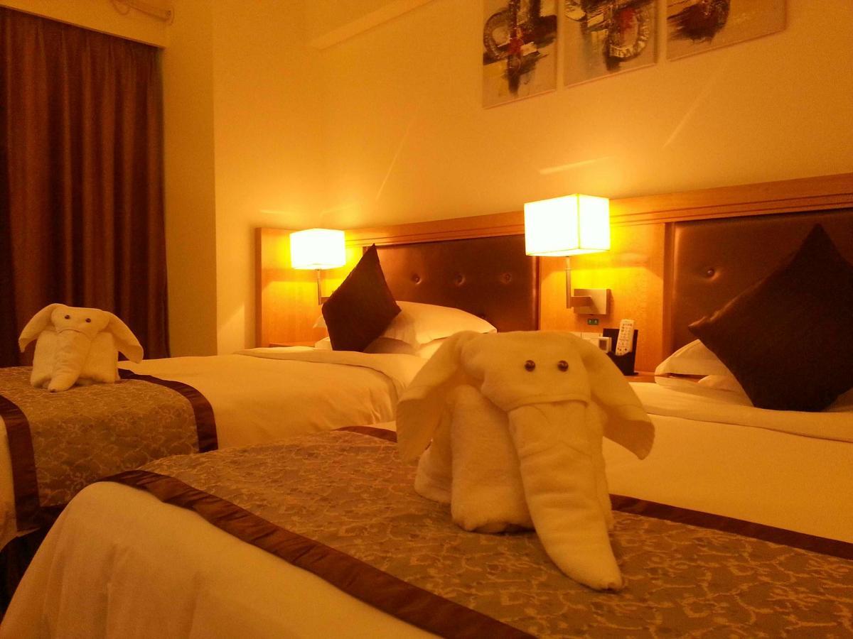 Xinhan Business Hotel Xianyang Экстерьер фото